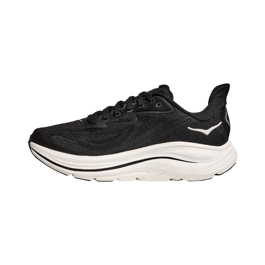 Side view of the HOKA Women’s Clifton 10 in Black/White, showcasing the lightweight jacquard knit upper, plush CMEVA midsole cushioning, and smooth MetaRocker™ geometry for a soft, efficient ride.