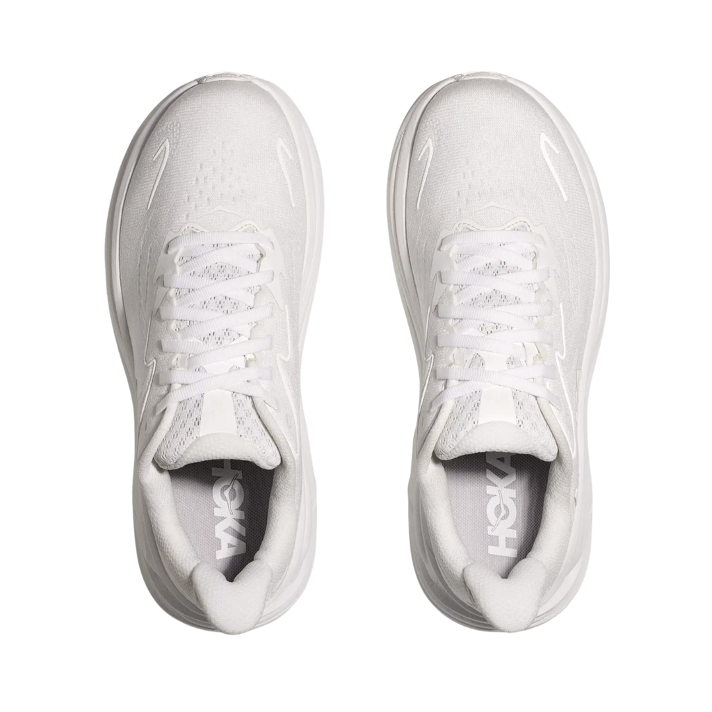 Top view of the HOKA Women’s Clifton 10 in White/White, showcasing the molded EVA sockliner, padded tongue, and double-lace lock system for secure, cushioned all-day comfort.