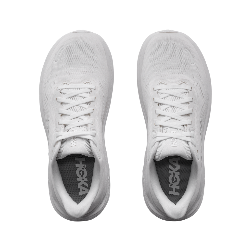 Top view of the Women's HOKA Clifton 11 in White/White displaying the breathable engineered mesh upper, double-lace lock system, open-cell sockliner, and supportive midfoot construction for a secure, comfortable fit.