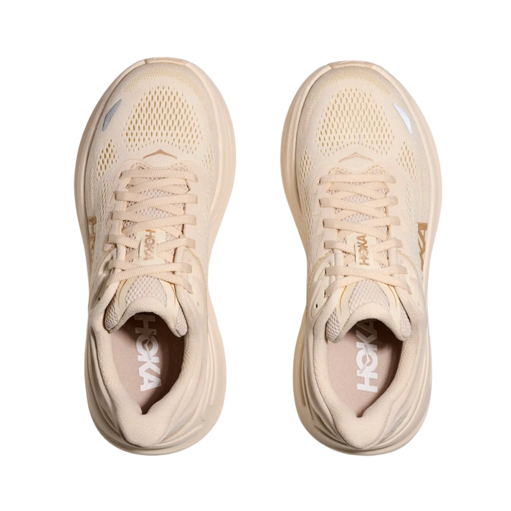 Top view of the HOKA Women’s Bondi 9 in Vanilla/Birch, showing the molded EVA sockliner, padded tongue, and secure lace-up system for cushioned all-day comfort.
