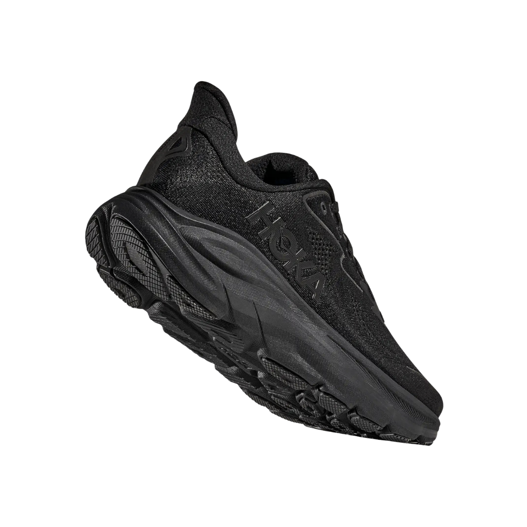 Bottom heel view of the HOKA Women’s Clifton 10 in Black/Black, highlighting the durable outsole with traction zones designed for reliable grip and long-lasting performance.