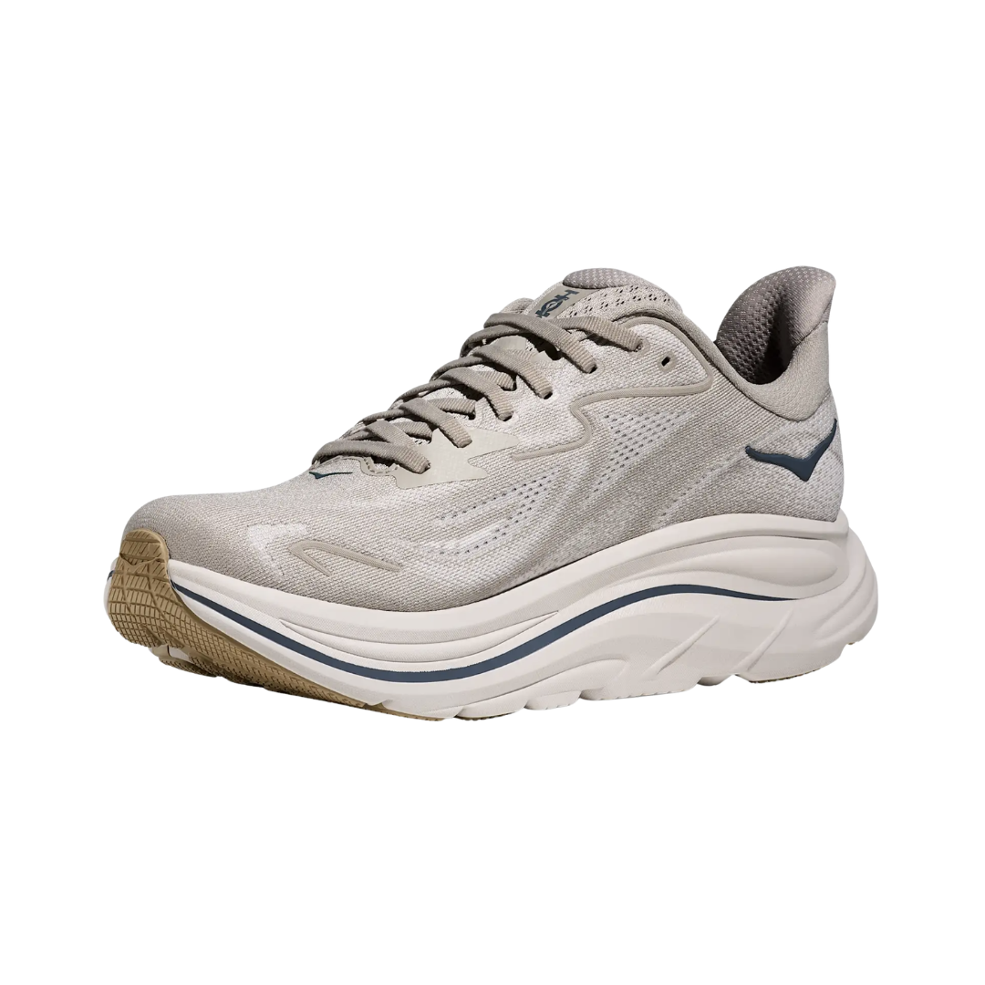 Side view of the HOKA Men’s Clifton 10 in Putty/Grout, showcasing the lightweight jacquard knit upper, plush CMEVA midsole cushioning, and smooth MetaRocker™ geometry for a soft, efficient ride.