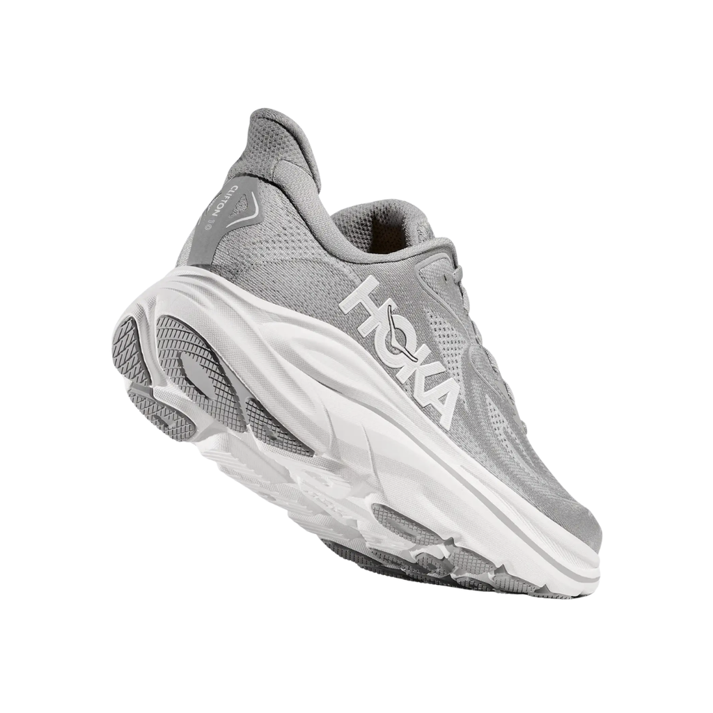 Bottom heel view of the HOKA Women’s Clifton 10 in Stellar Grey/Galactic Grey, highlighting the durable outsole with traction zones designed for reliable grip and long-lasting performance.