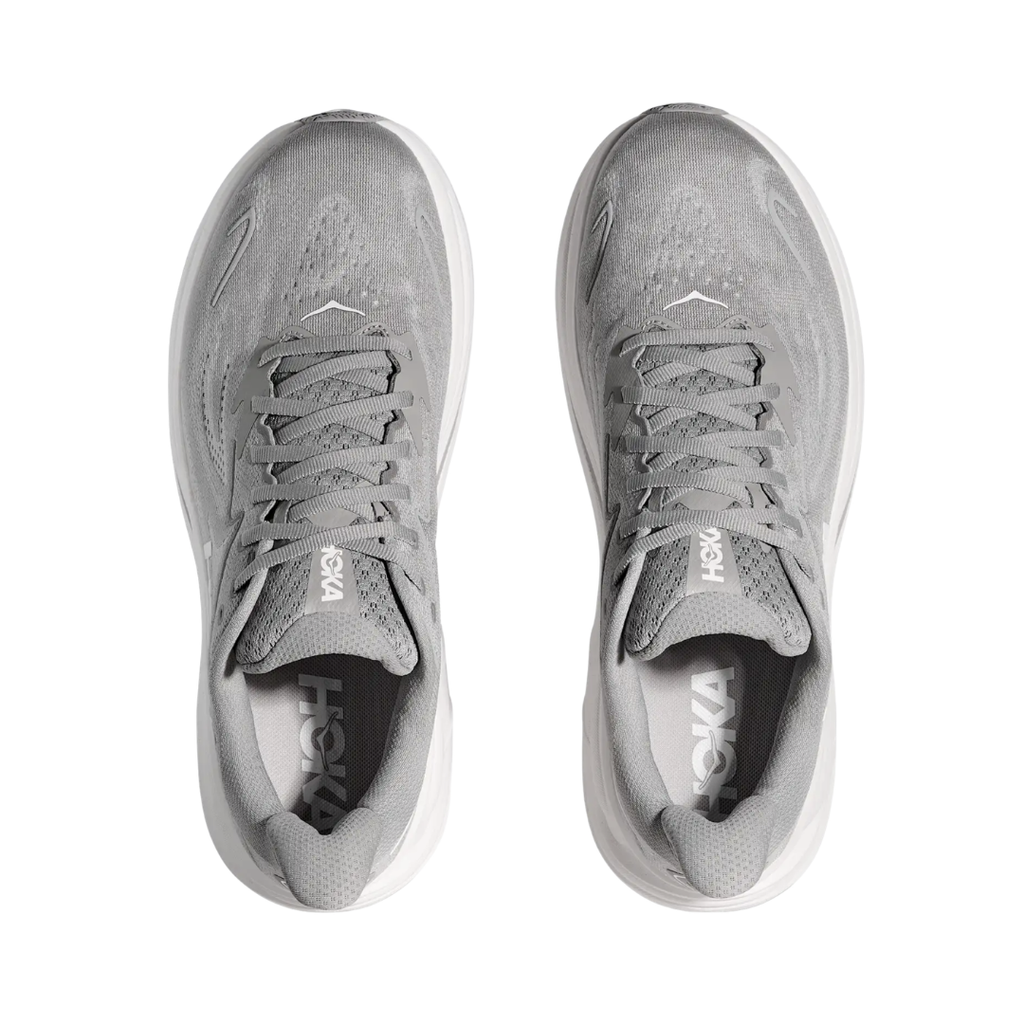 Top view of the HOKA Men’s Clifton 10 in Stellar Grey/Stardust, showing the molded EVA sockliner, padded tongue, and double-lace lock system for secure, cushioned all-day comfort.