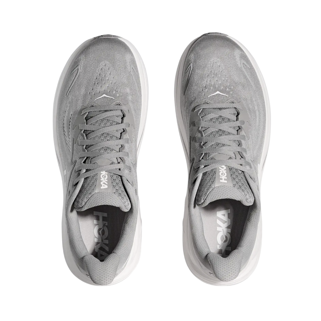 Top view of the HOKA Women’s Clifton 10 in Stellar Grey/Galactic Grey, showing the molded EVA sockliner, padded tongue, and double-lace lock system for secure, cushioned all-day comfort.