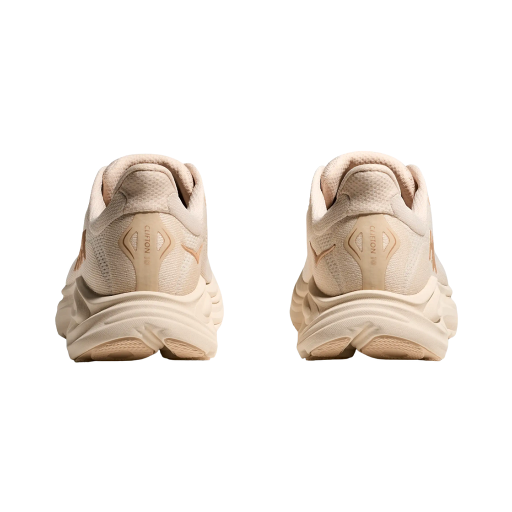 Heel view of the HOKA Women’s Clifton 10 in Vanilla/Birch, highlighting the rearfoot-focused Active Foot Frame™ and padded heel collar for stable landings and secure support.