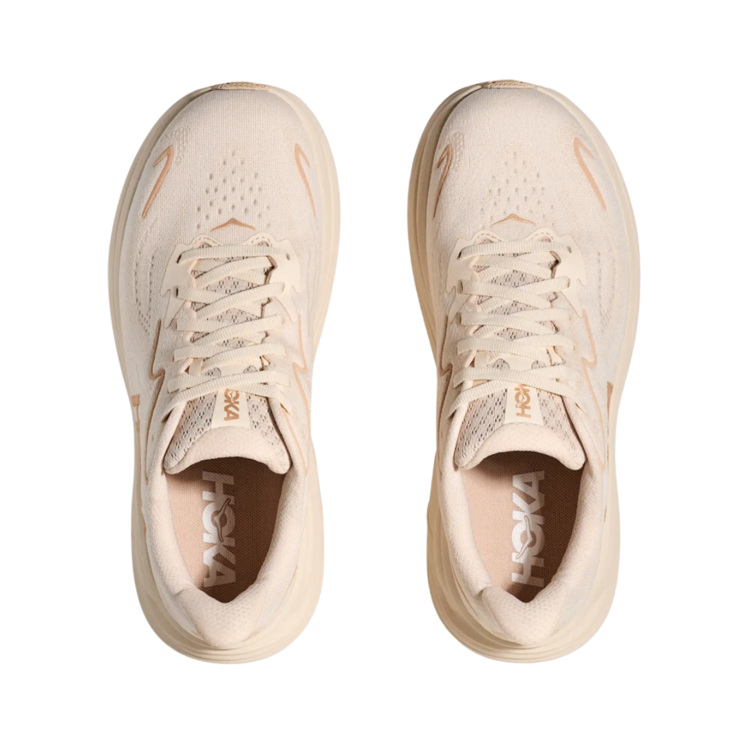 Top view of the HOKA Women’s Clifton 10 in Vanilla/Birch, showing the molded EVA sockliner, padded tongue, and double-lace lock system for secure, cushioned all-day comfort.