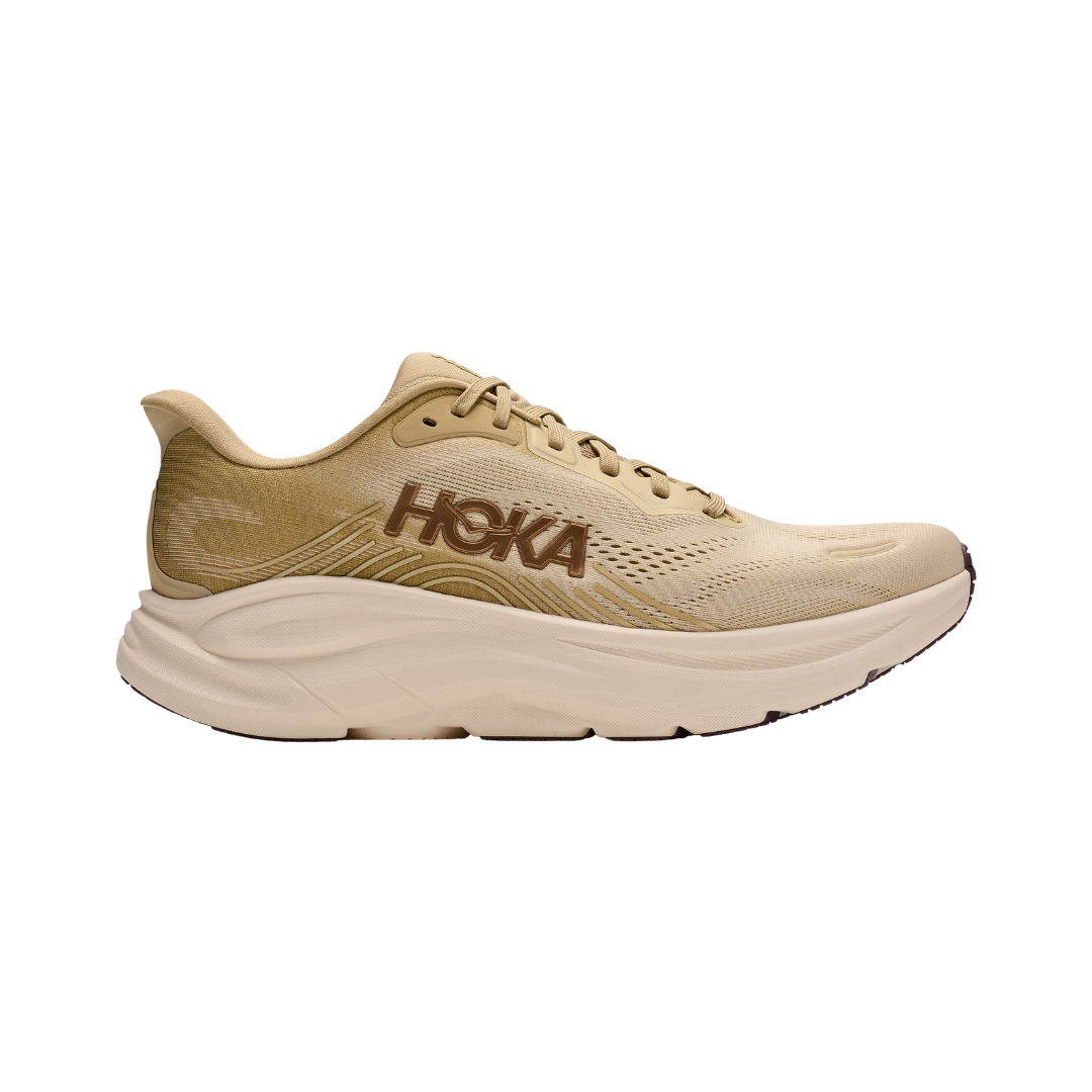 Side view of the Men's Hoka Clifton 11 in Barley Flour/Barley, featuring a breathable engineered mesh upper, lightweight compression-molded EVA foam midsole, MetaRocker™ geometry, and durable abrasion-resistant rubber outsole.