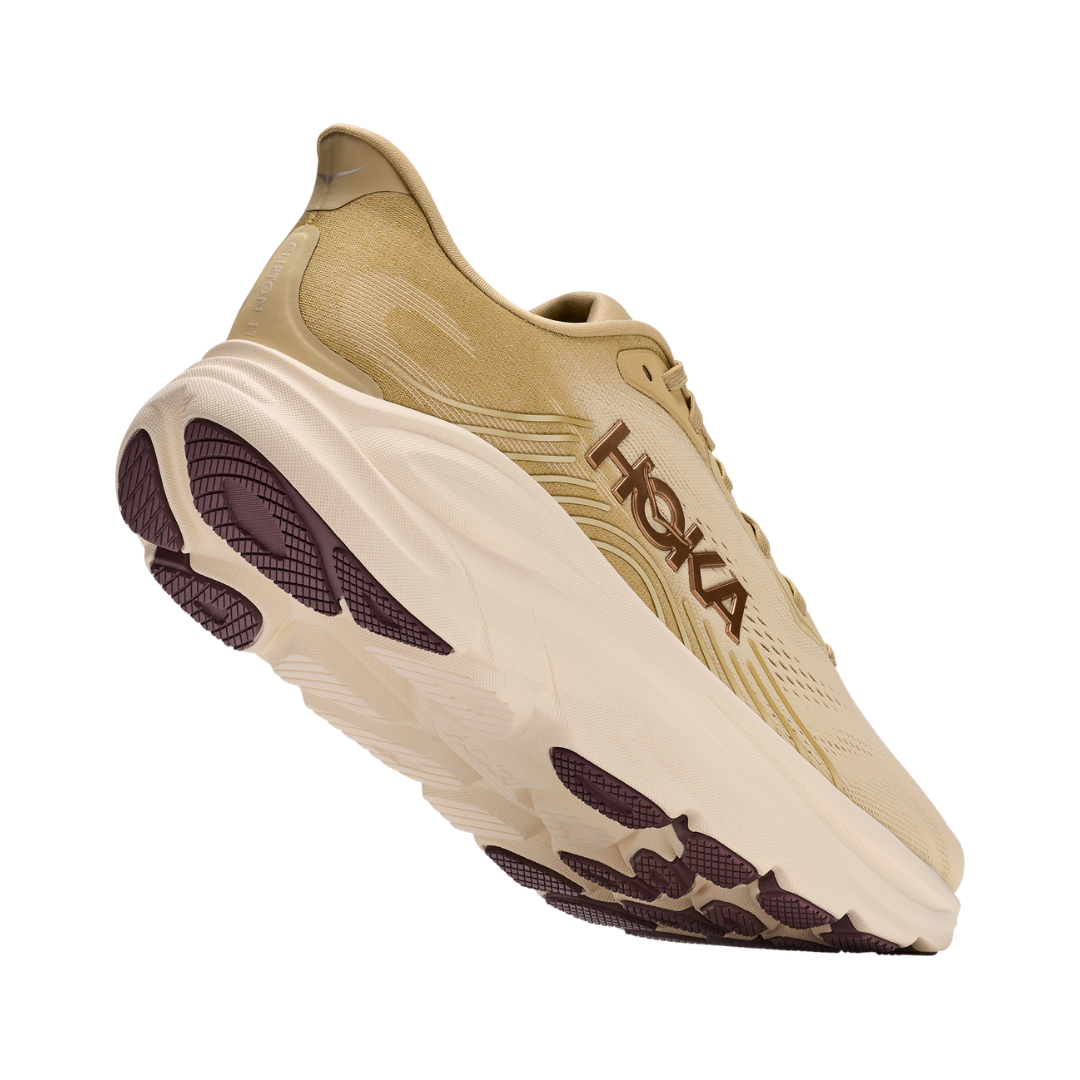 Heel view of the Men's Hoka Clifton 11 in Barley Flour/Barley, highlighting the supportive heel construction, Active Foot Frame™ designed to cradle the rearfoot, and reflective details for added visibility.