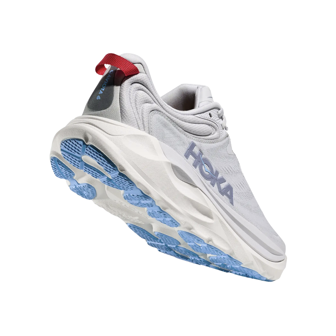 Bottom heel view of the Women’s HOKA Gaviota 6 in Cosmic Grey/Stardust, highlighting the high-abrasion rubber outsole designed for durable traction, maximum stability, and extended wear during running, walking, or daily activity.