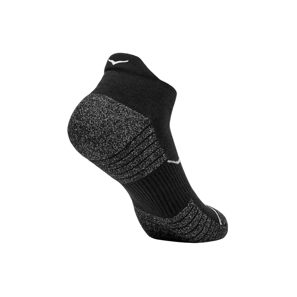 Back side view of the HOKA Unisex No-Show Run Socks in Black, highlighting the reflective HOKA bird logo at the back and the low-profile design that pairs easily with athletic footwear.