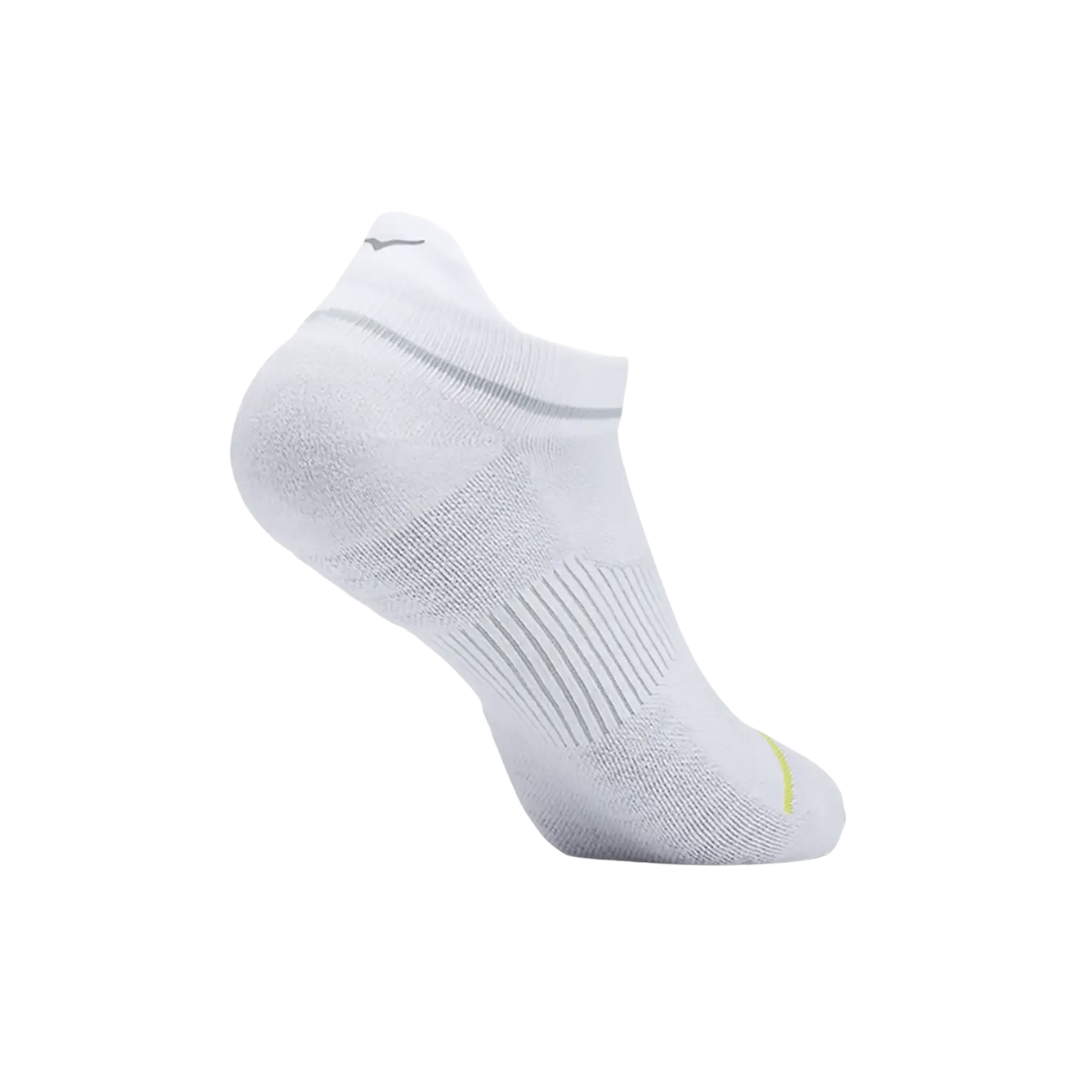 Side view of the HOKA Unisex No-Show Run Socks in White, featuring the low-profile ankle-grazing design, form-fitting construction, and engineered arch support for a secure fit during running, walking, and training.