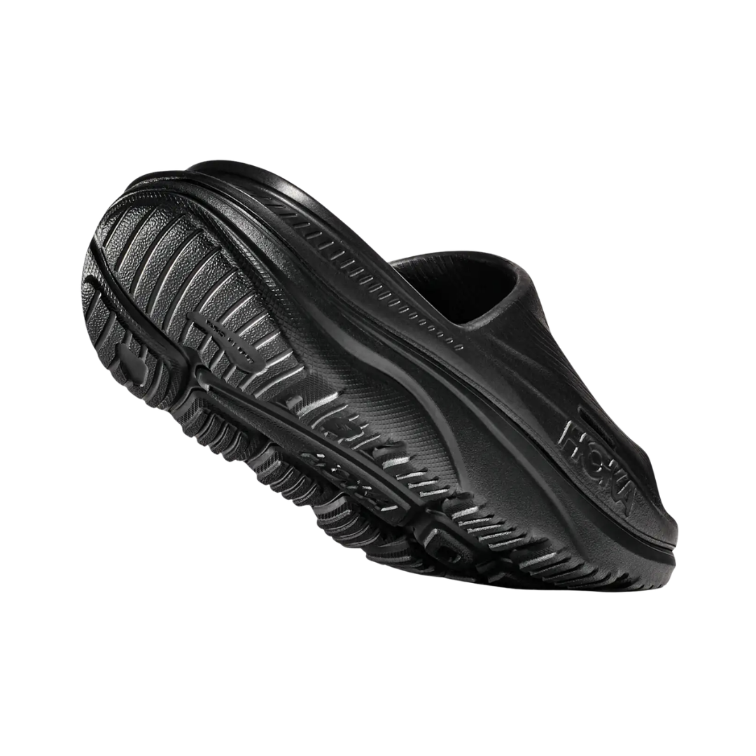 Rear view of the Unisex HOKA Ora Recovery Slide 3 in Black highlighting the refined heel shape, cushioned heel area, supportive EVA construction, and lightweight design for a comfortable, secure fit.