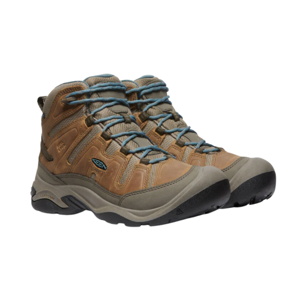 KEEN Women's Circadia Mid Waterproof Hiking Boot in Coconut/North Atlantic featuring KEEN.DRY waterproof protection, a durable upper, cushioned EVA midsole, and high-traction rubber outsole.