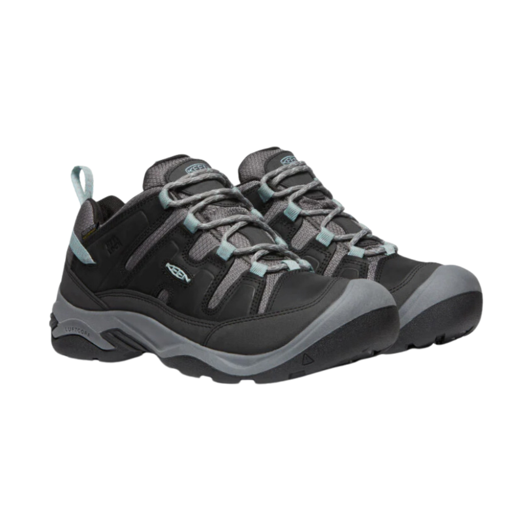 KEEN Women's Circadia Low Waterproof Hiking Shoe in Black/Cloud Blue featuring a durable upper, KEEN.DRY waterproof protection, cushioned EVA midsole, and high-traction rubber outsole.