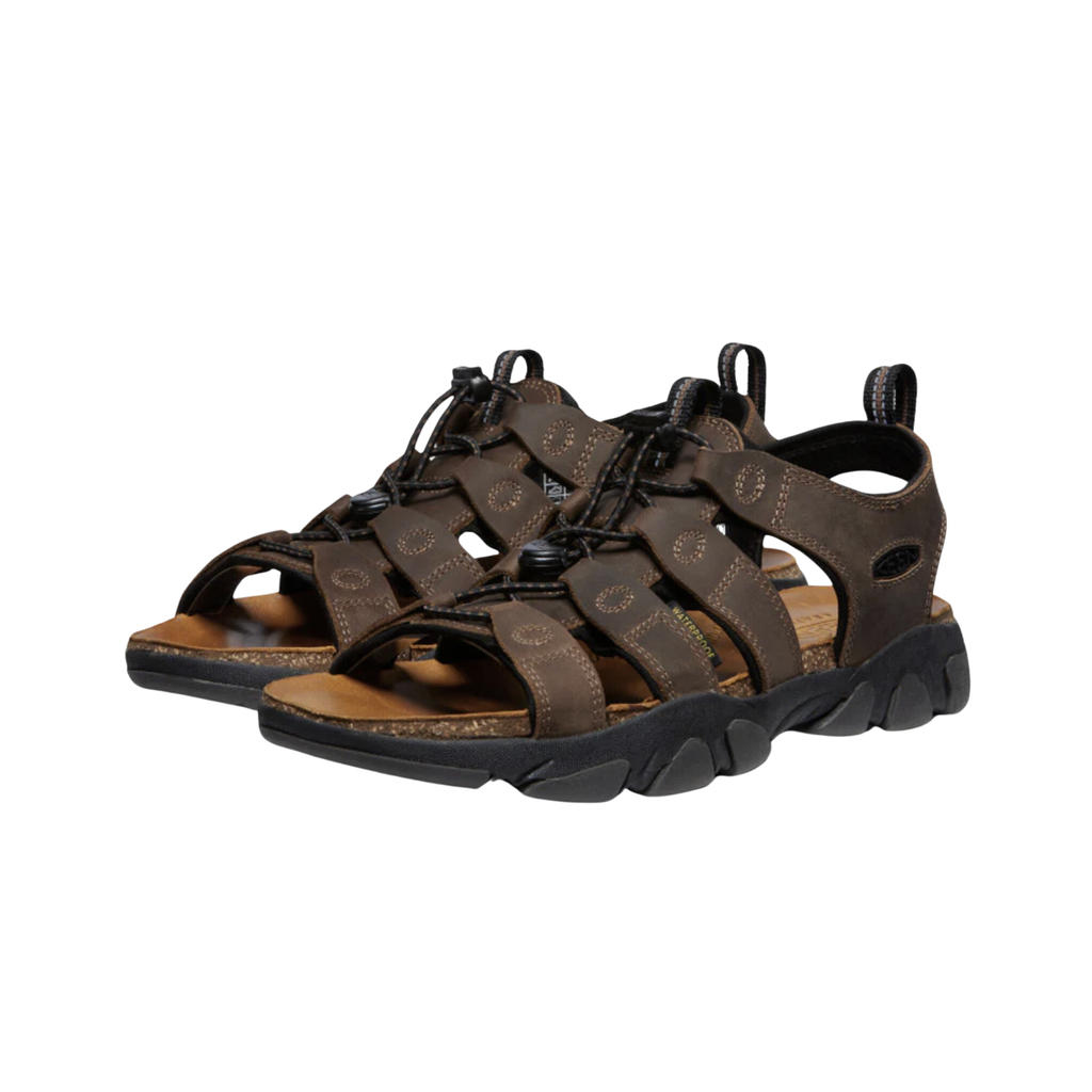 Side view of the Men’s Keen Daytona II Sandal in Bison/Black, showing the open-toe design, premium oiled leather upper, and adjustable lace-capture system for a secure fit.