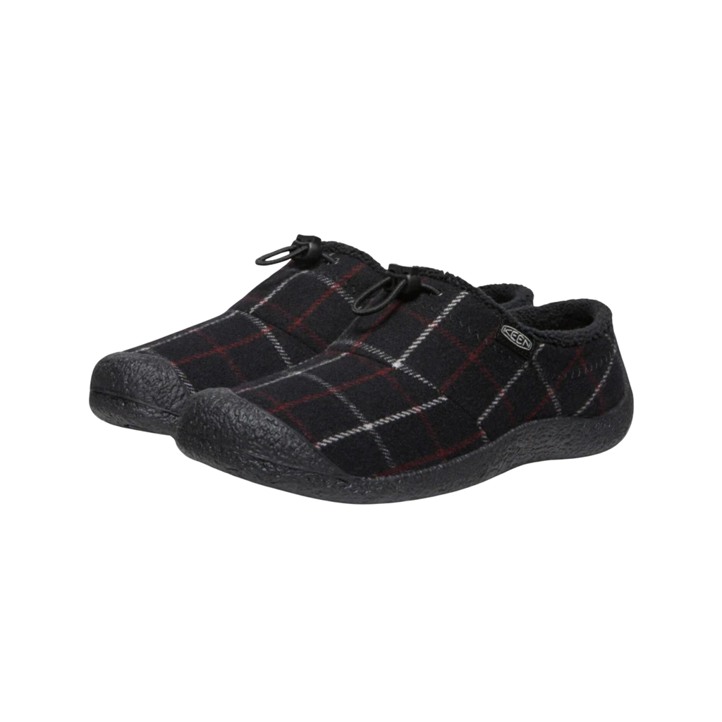 Side view of the KEEN Women's Howser III Slide in Black Plaid, featuring a soft textile upper, slip-on design, stretch gore panels, and non-marking rubber outsole.