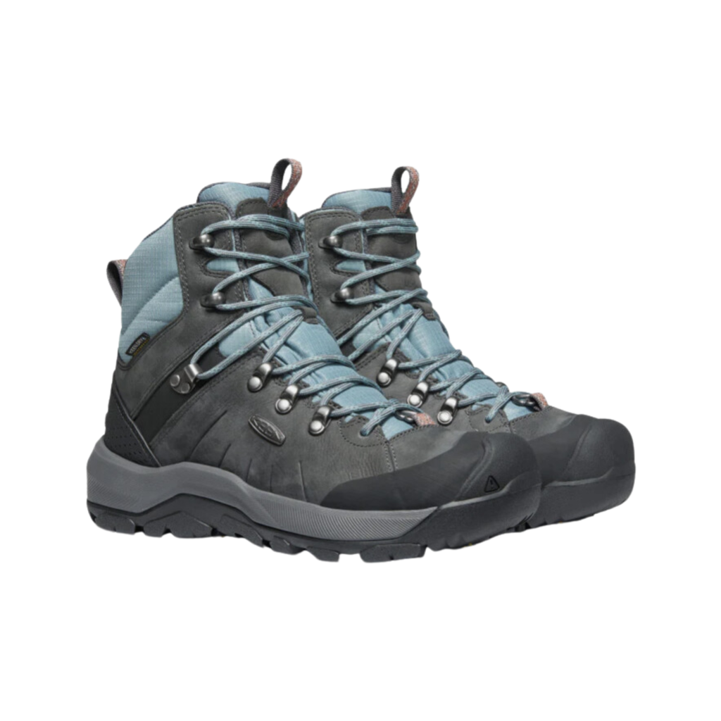 Side view of the KEEN Women's Revel IV Polar Winter Boot in Magnet/North Atlantic, featuring an insulated upper, waterproof construction, dual-density EVA midsole, and rugged rubber outsole.