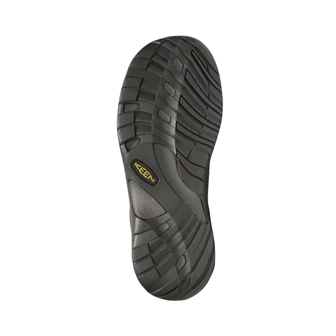 Bottom view of the KEEN Men's Austin in Brindle/Bungee Cord highlighting the non-marking rubber outsole and traction pattern designed to provide reliable grip across indoor and outdoor everyday surfaces.