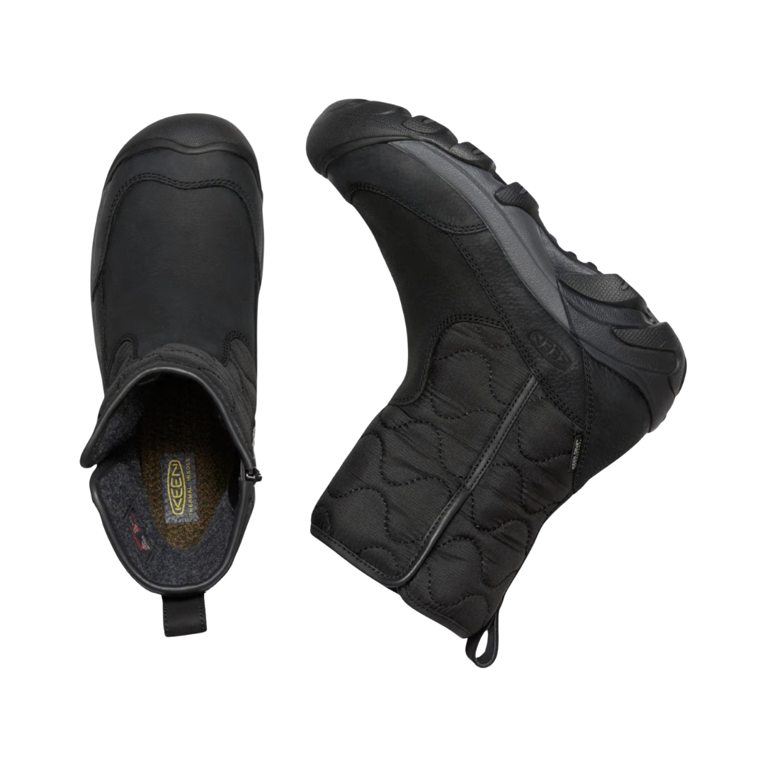 KEEN Women's Betty Waterproof Pull-On Boot in Black displaying the easy slip-on opening, soft microfleece lining, and removable cushioned footbed that accommodates custom orthotics.