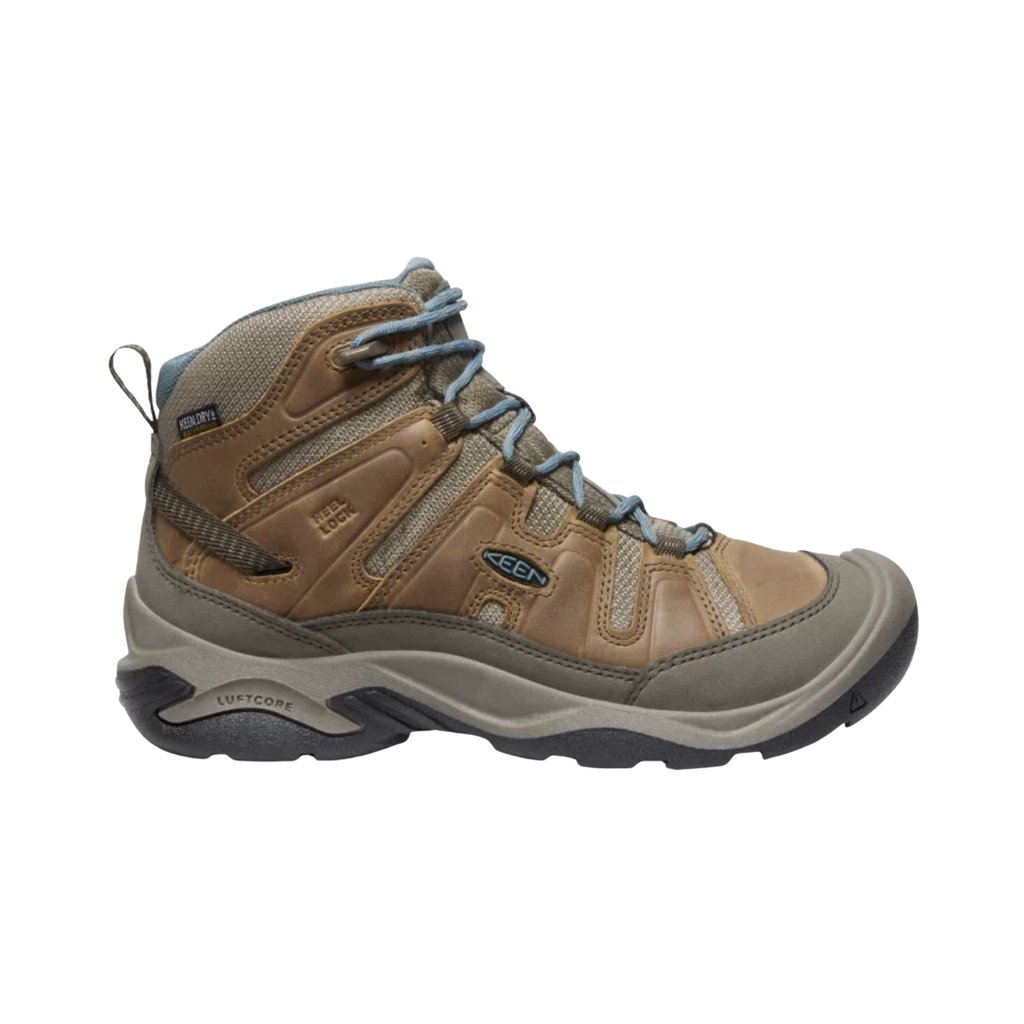 KEEN Women's Circadia Mid Waterproof Hiking Boot in Coconut/North Atlantic featuring KEEN.DRY waterproof protection, a durable upper, cushioned EVA midsole, and high-traction rubber outsole.