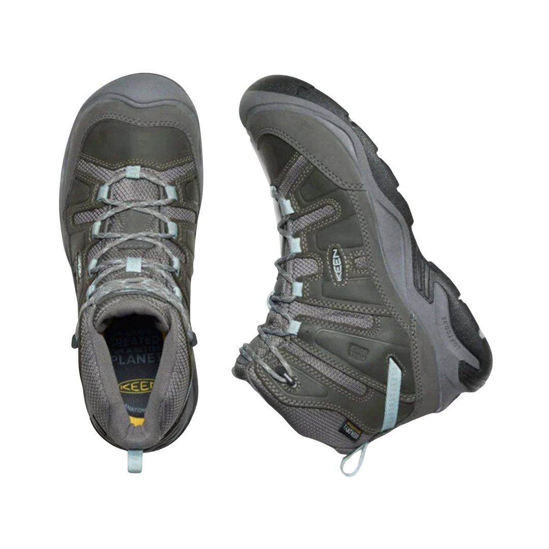 KEEN Women's Circadia Mid Waterproof Hiking Boot in Steel Grey/Cloud Blue displaying the lace-up design, padded collar, and removable footbed that accommodates custom or over-the-counter orthotics.