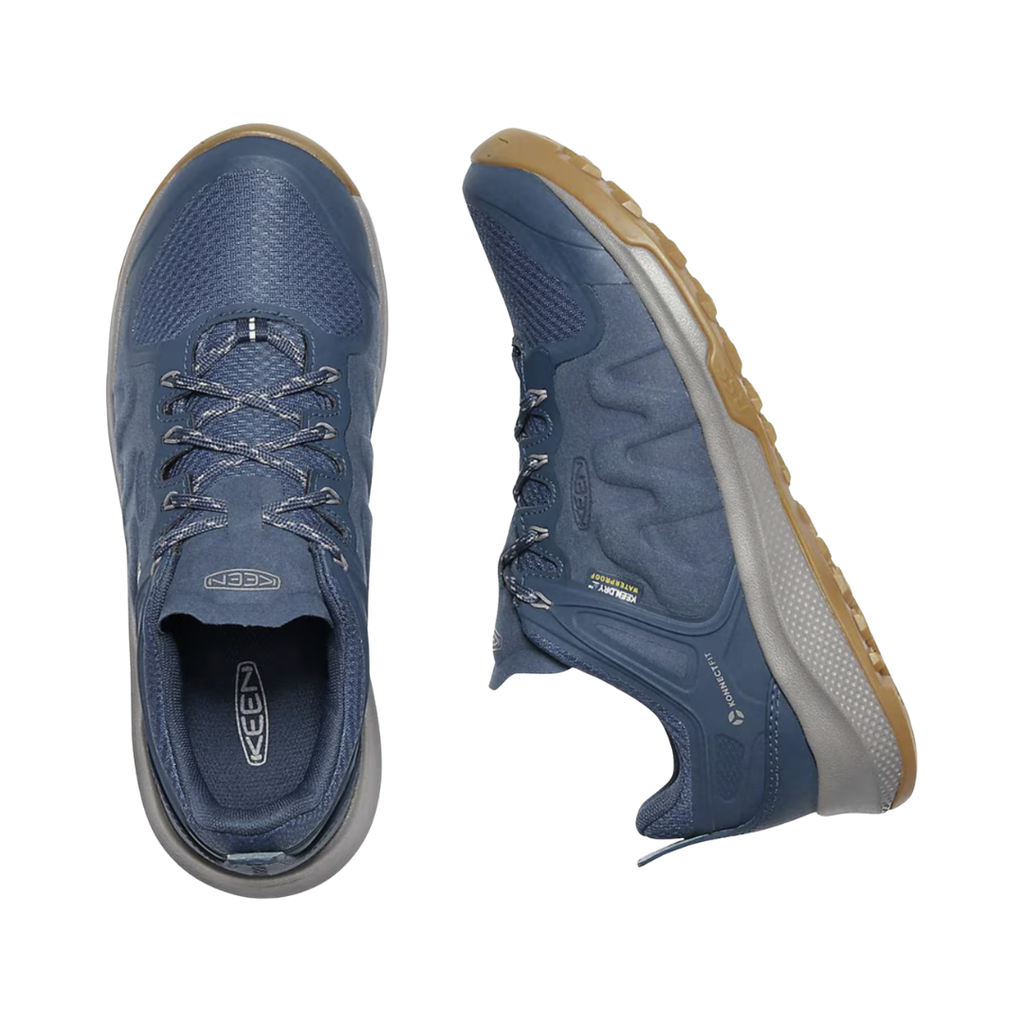 KEEN Women's Explore Waterproof Hiker in Majolica Blue/Satellite displaying the mesh upper, lace-up closure, and removable PU footbed for cushioned, orthotic-friendly comfort.