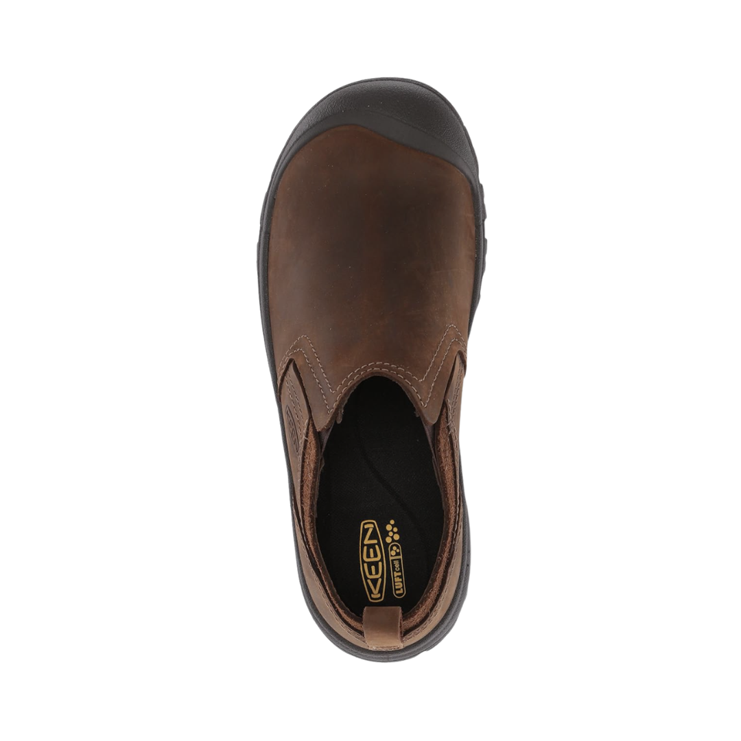 Top view of the KEEN Men's Grayson Slip-On in Mid Brown/Scylum displaying the premium leather upper, stretch-gore panels, breathable lining, and removable insole designed for comfortable extended wear and orthotic compatibility.