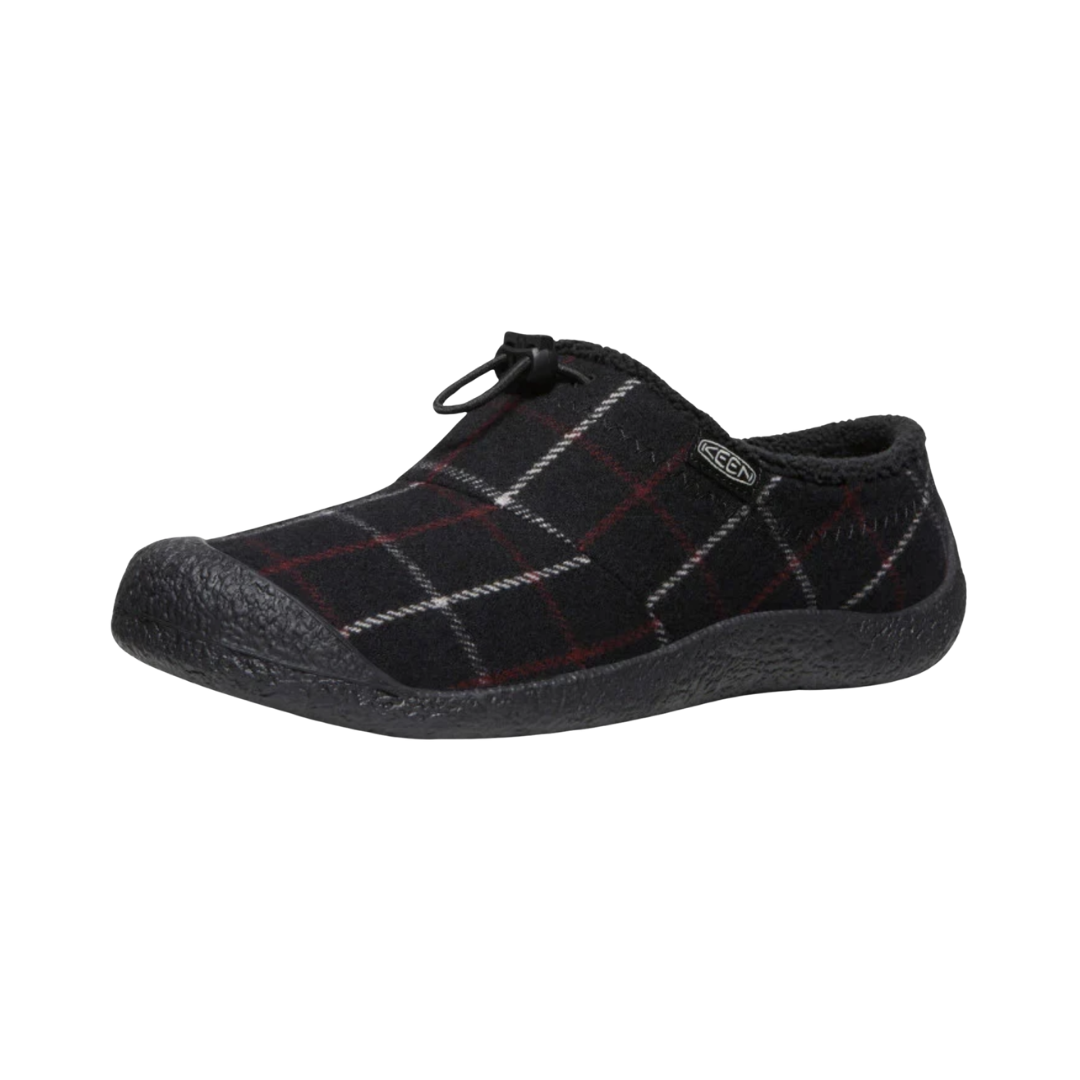 Side view of the KEEN Women's Howser III Slide in Black Plaid, featuring a soft textile upper, slip-on design, stretch gore panels, and non-marking rubber outsole.
