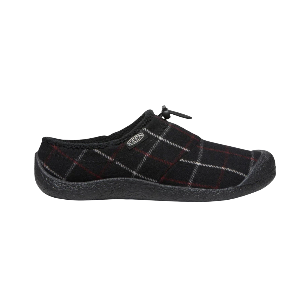 Side view of the KEEN Women's Howser III Slide in Black Plaid, featuring a soft textile upper, slip-on design, stretch gore panels, and non-marking rubber outsole.