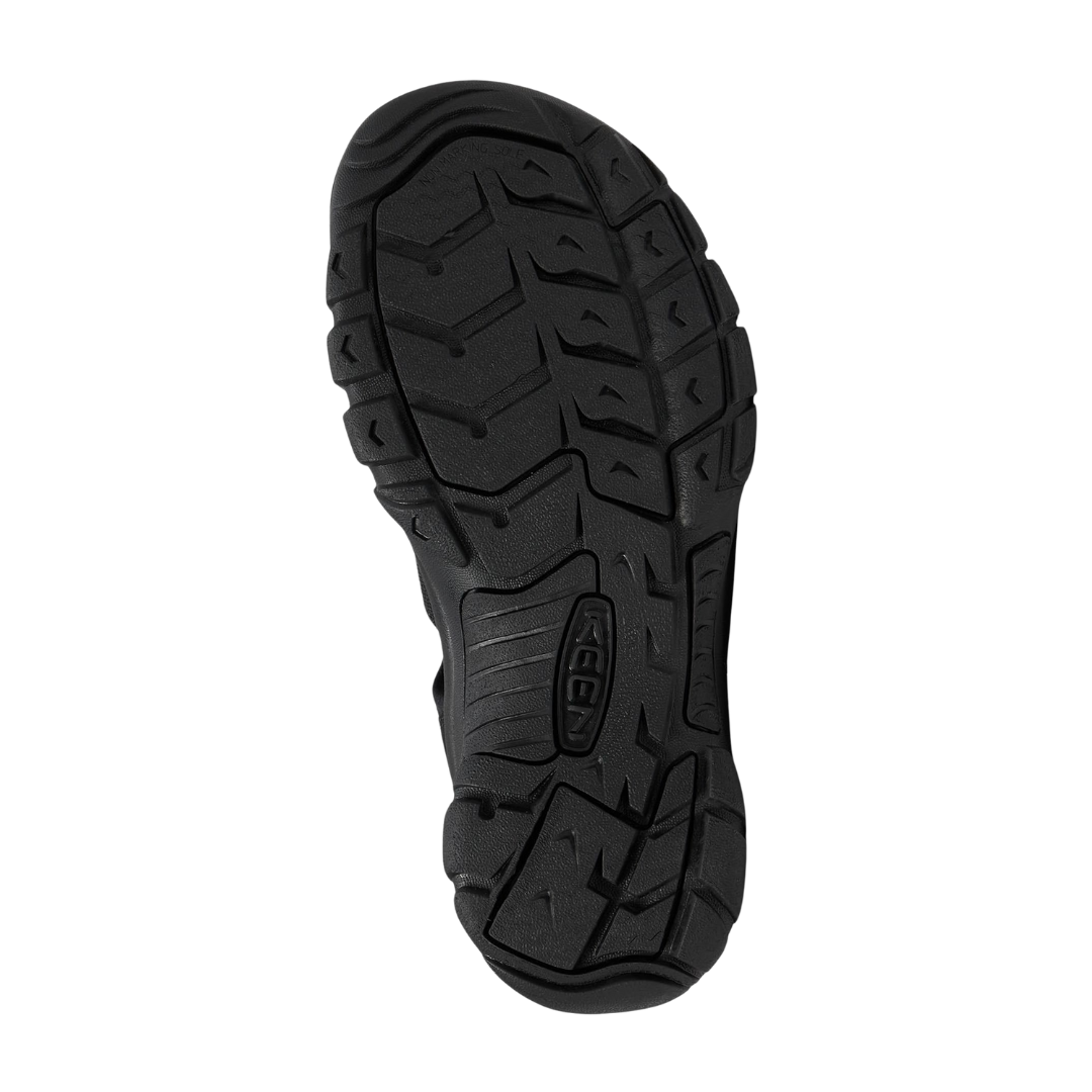 Bottom view of the Men’s Keen Newport H2 in Triple Black, showcasing the non-marking rubber outsole with razor siping for superior wet and dry traction.