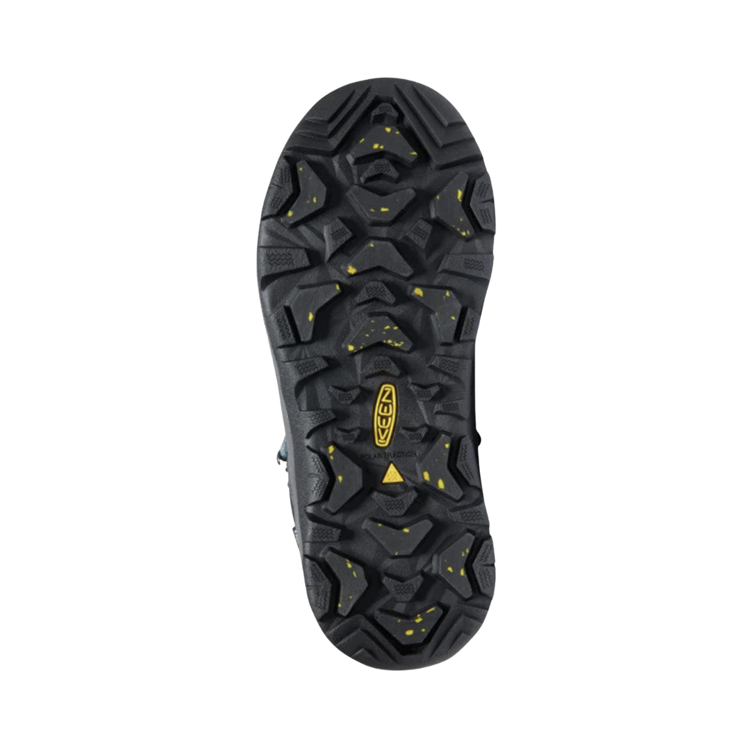Bottom view of the KEEN Women's Revel IV Polar Winter Boot in Magnet/North Atlantic, featuring an all-terrain rubber outsole with multidirectional lugs for traction on snow, slush, and icy surfaces.