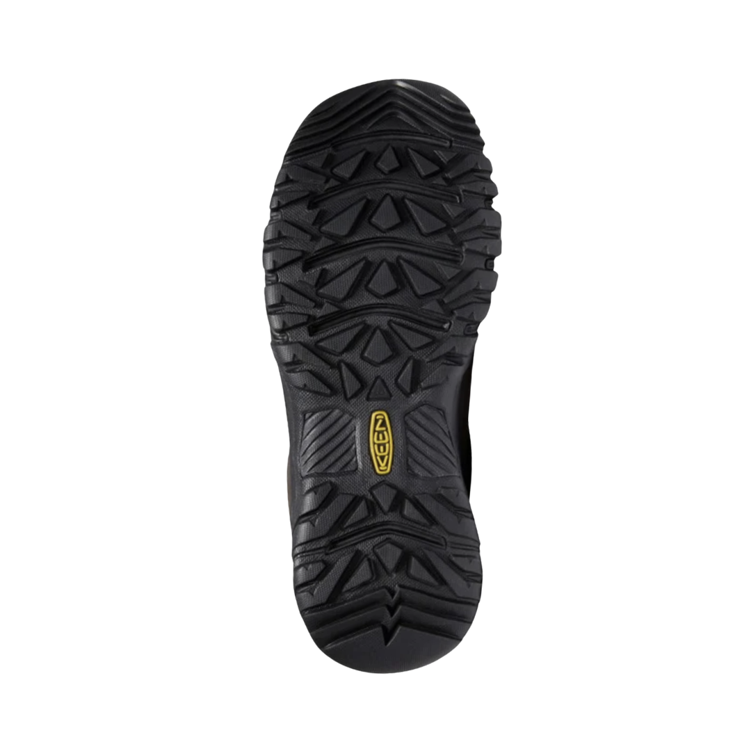 Bottom view of the KEEN Men's Targhee III Oxford in Earth/Mulch highlighting the all-terrain rubber outsole and multidirectional lug pattern designed to provide reliable grip on varied indoor and outdoor surfaces.