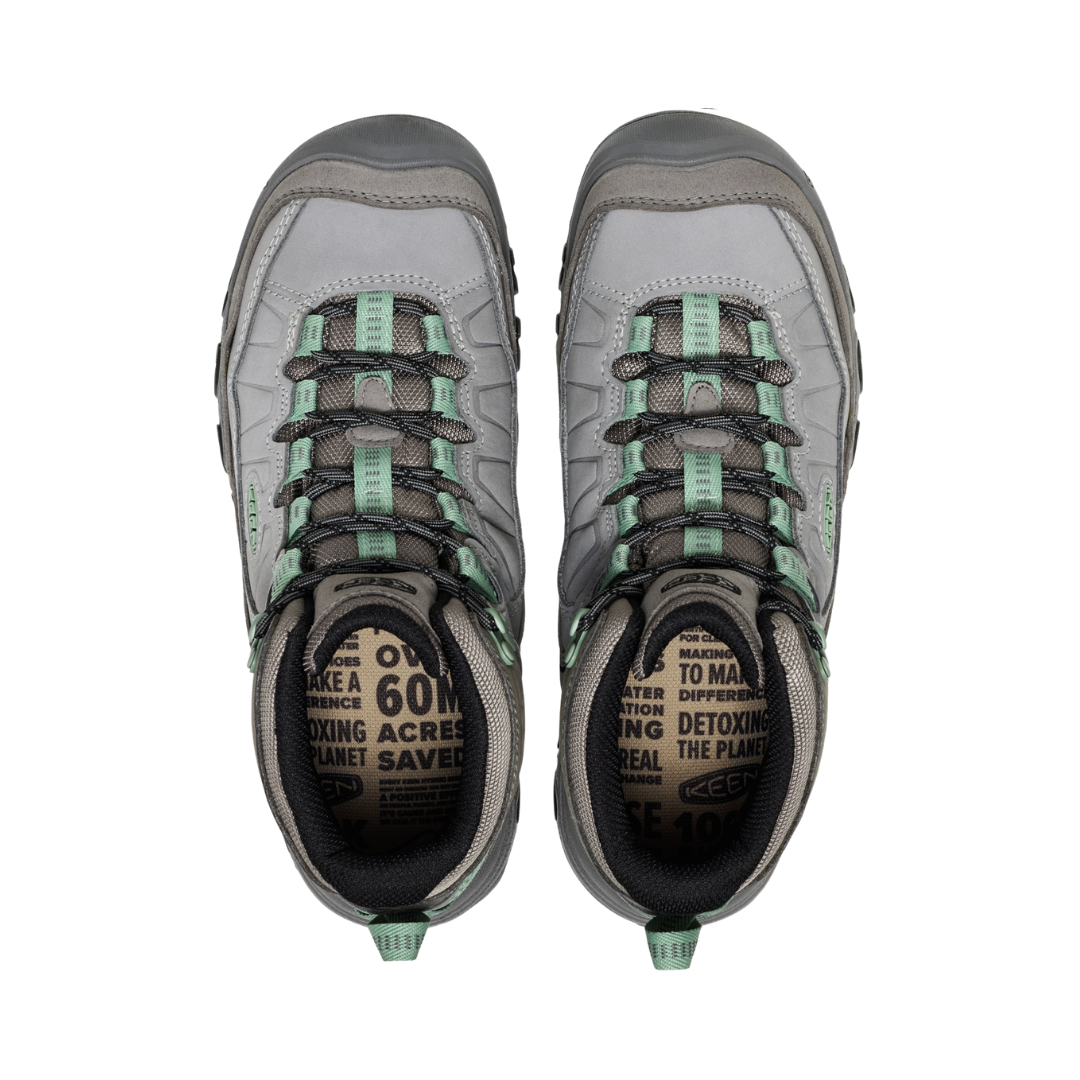 Top view of the KEEN Women's Targhee IV Mid Waterproof Boot in Alloy/Granite Green, displaying the lace-up closure, durable leather upper, and removable cushioned EVA footbed designed to accommodate custom and over-the-counter orthotics.