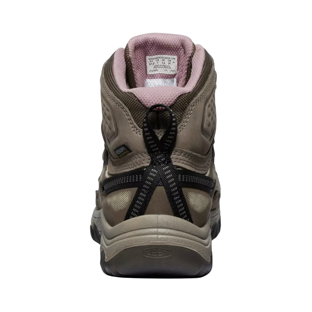 Heel view of the KEEN Women's Targhee IV Mid Waterproof Boot in Brindle/Nostalgia Rose, highlighting the supportive heel capture system designed to help reduce heel slippage on uneven terrain.