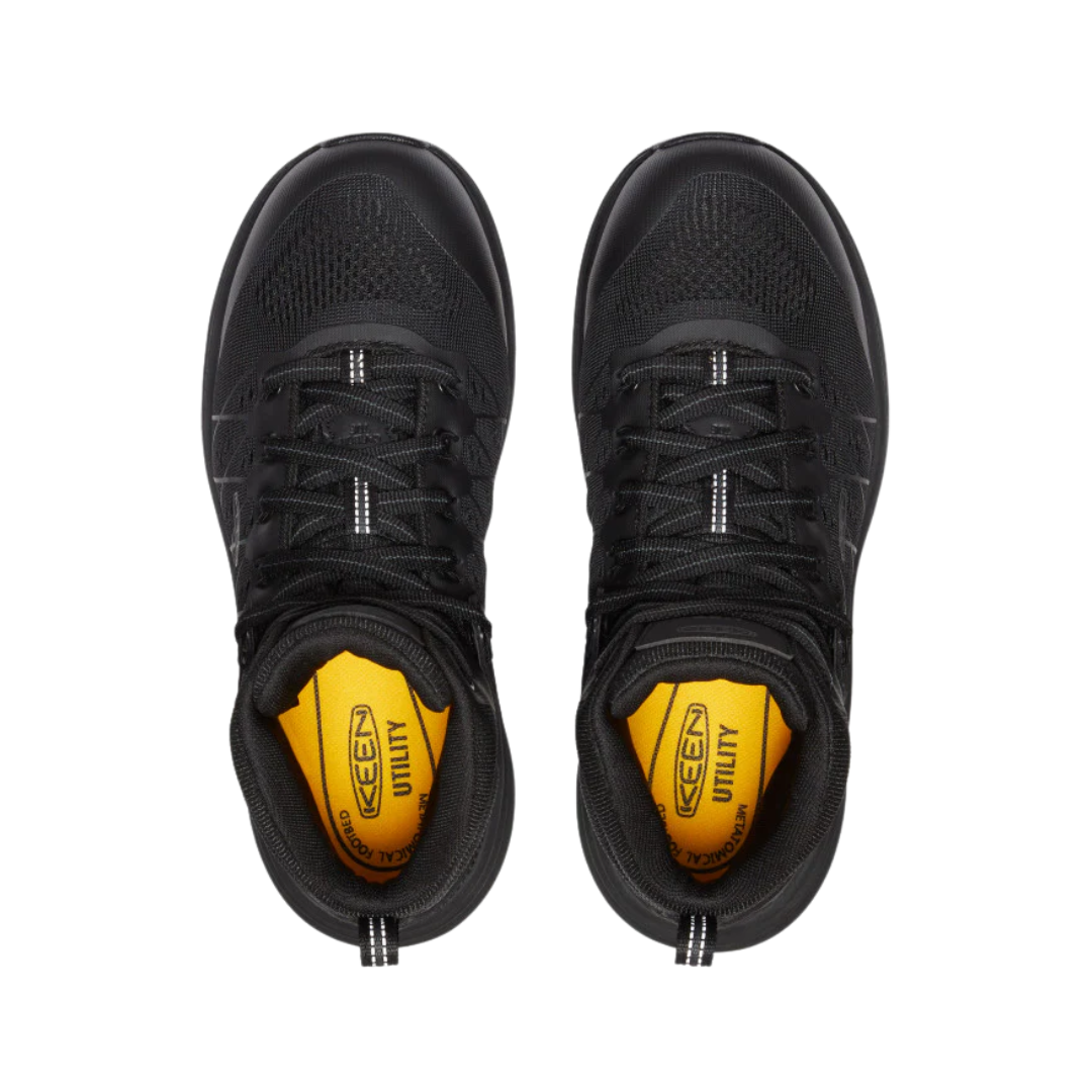 Top view of the KEEN Women's Vista Energy Mid INT MET Carbon Toe Work Boot in Black/Raven, displaying the lace-up closure, padded opening, and design incorporating an internal metatarsal guard for added protection across the top of the foot.