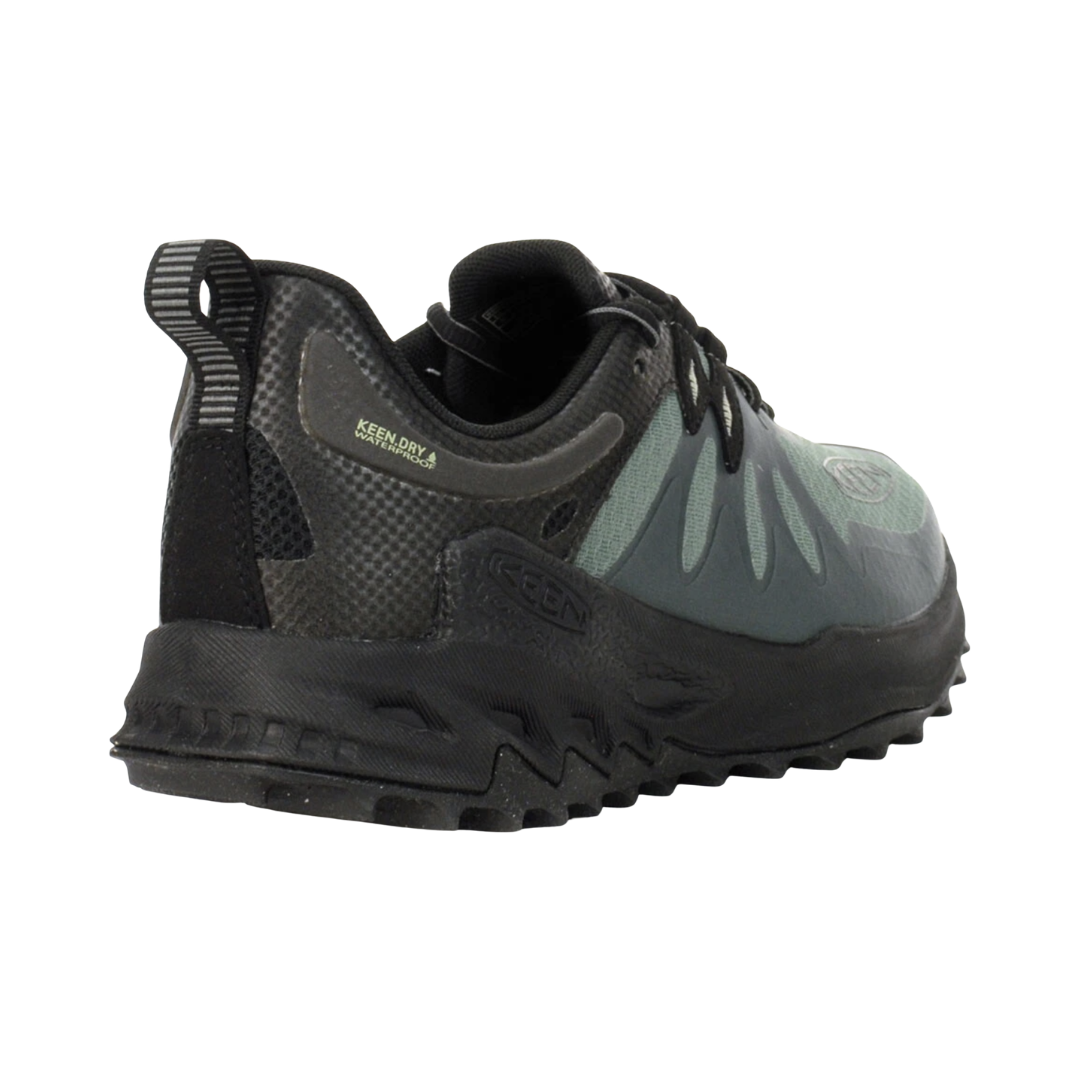 KEEN Men's Zionic Waterproof Hiking Shoe in Dark Forest/Black highlighting the KonnectFit heel-capture system designed to provide a secure, locked-in fit for added stability.