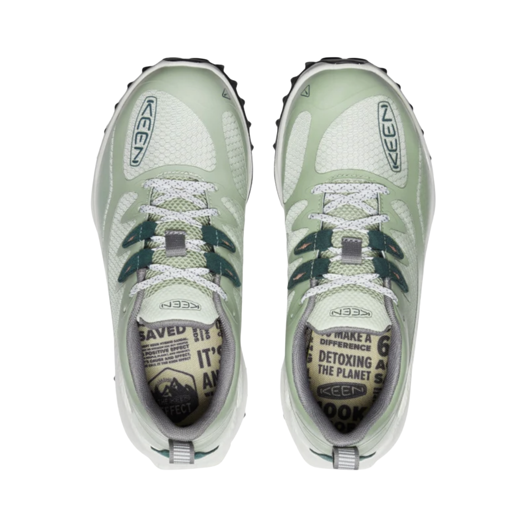 Top view of the KEEN Women's Zionic Waterproof Hiking Shoe in Desert Sage/Ember Glow, displaying the performance mesh upper, lace-up system, and removable EVA insole designed to accommodate custom or over-the-counter orthotics.