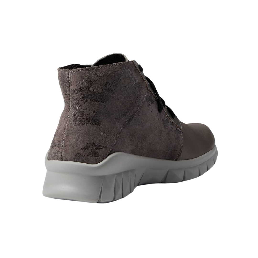 Heel view of the Women’s Naot Polaris in Foggy Gray/Gray Marble, showing the cushioned heel cup, supportive structure, and slip-resistant polyurethane sole.
