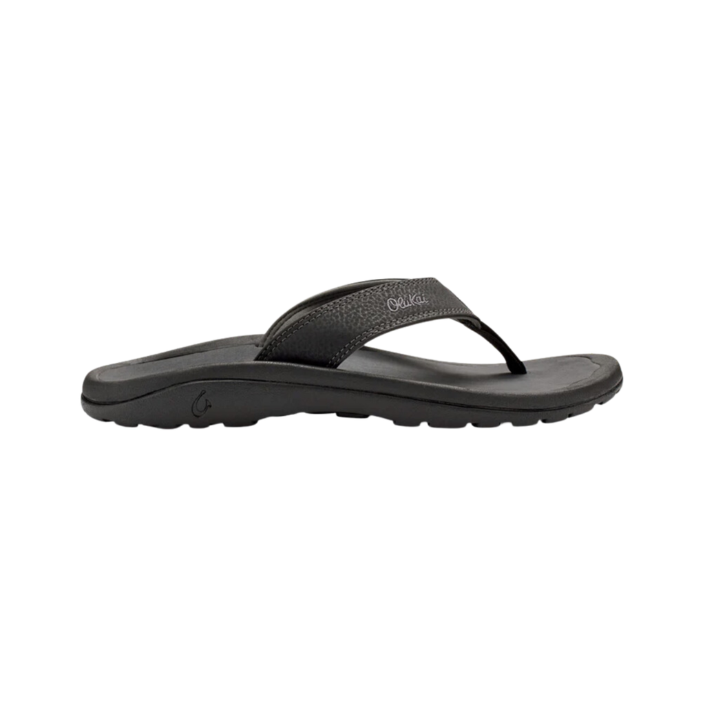 Side view of the Men’s Olukai ʻOhana in Black/Dark Shadow, highlighting the water-resistant synthetic straps, anatomical EVA midsole, and flexible lightweight design.