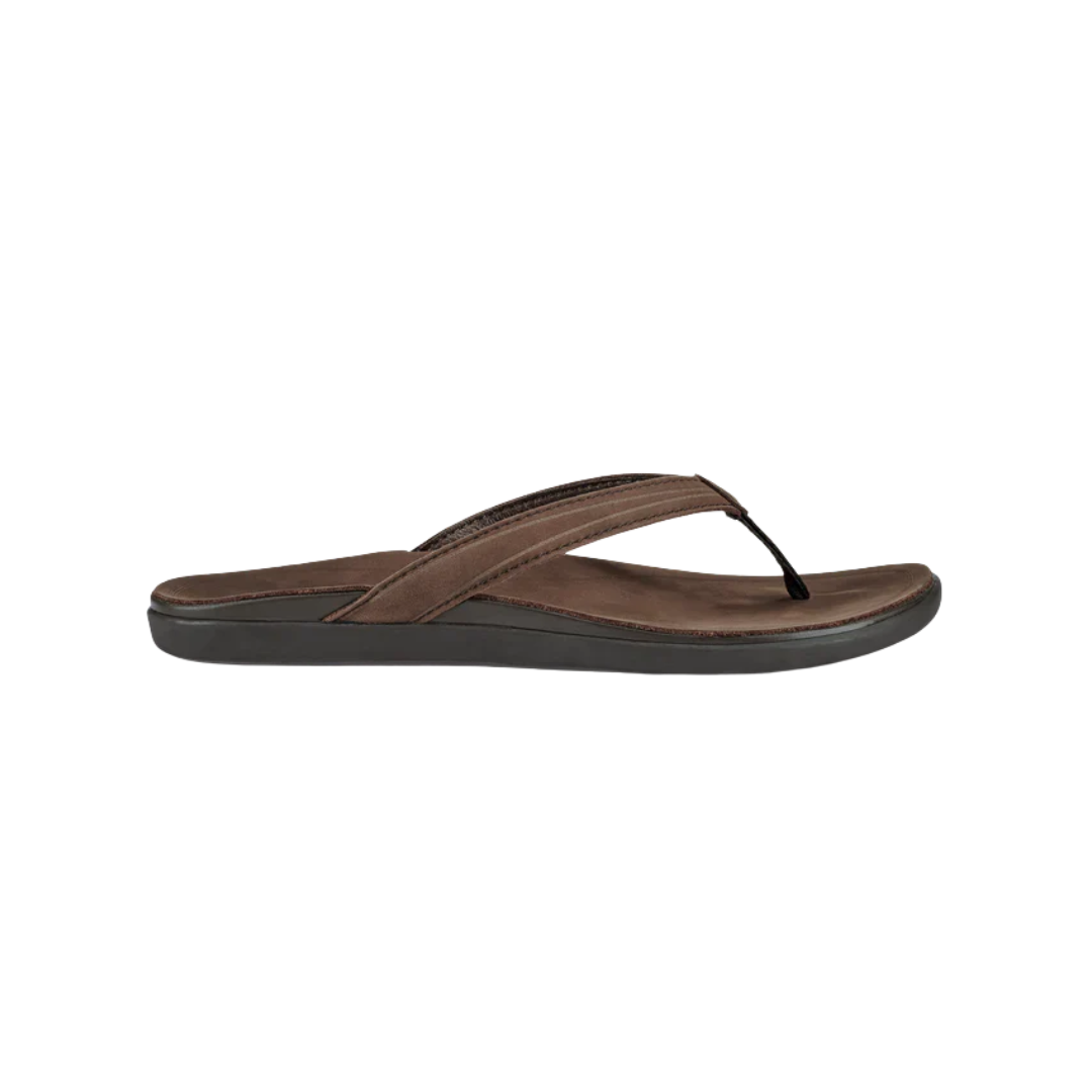 Side view of the Women’s Olukai ‘Aukai in Dark Java, showing the premium full-grain leather upper, contoured anatomical footbed, and water-resistant design.