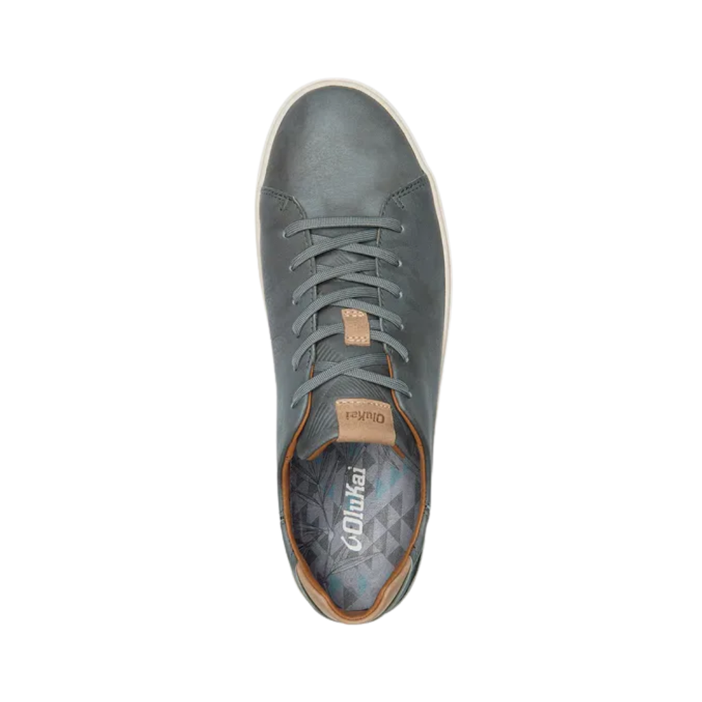 Top view of the Men’s Olukai Lae‘Ahi Li ‘Ili in Charcoal, showcasing the dual-density PU footbed, microfiber lining, and overall lace-free, slip-on-ready design.
