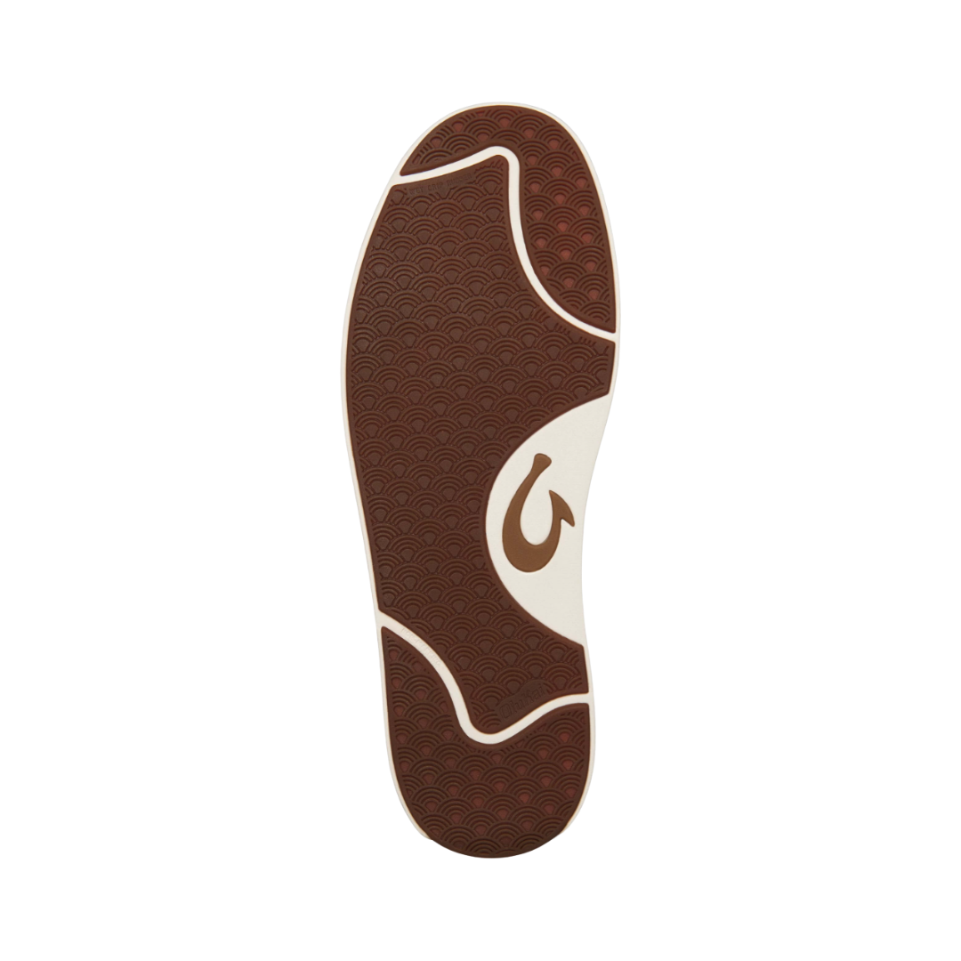 Bottom view of the Men’s Olukai Lae‘Ahi Li ‘Ili in Dark Wood, highlighting the non-marking Wet Grip rubber outsole with pod-style traction for reliable performance on wet or dry surfaces.