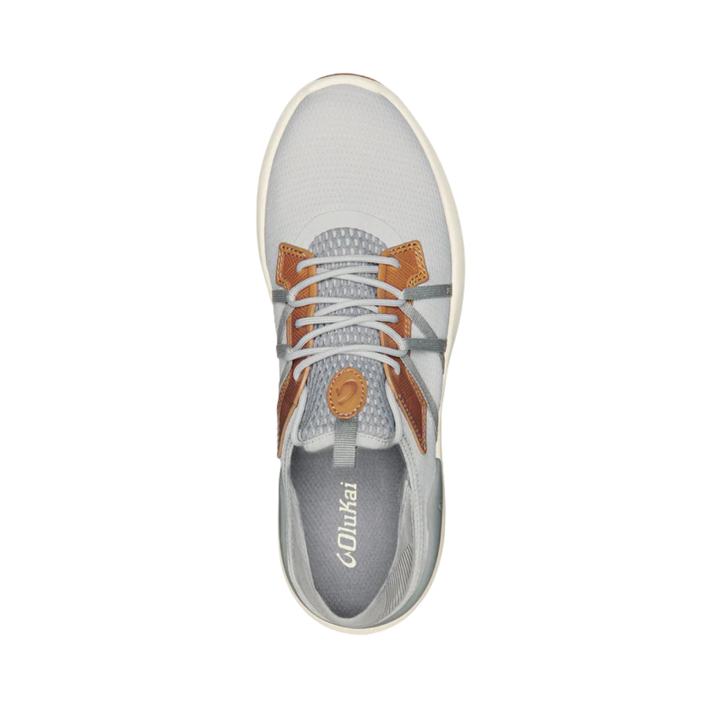 Top view of the Men’s Olukai Mio Li in Mist Grey/Poi, showcasing the anatomically contoured dual-density PU footbed, interior lining, and overall slip-on-ready design.