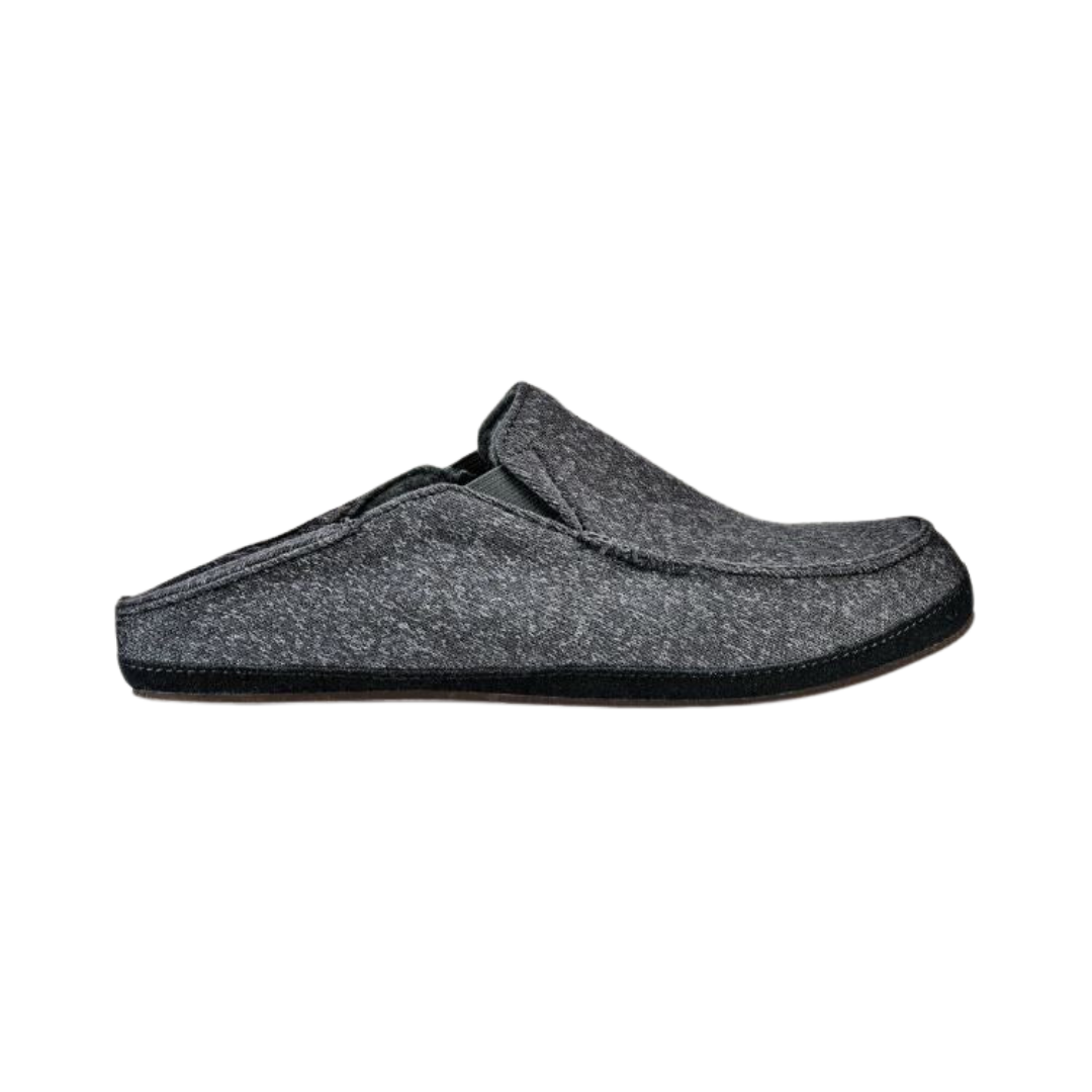 Side view of the Men’s Olukai Moloa Hulu in Dark Shadow, showcasing the rich nubuck leather upper, plush shearling lining peeking at the collar, and ergonomic Drop-In Heel® design for versatile wear.