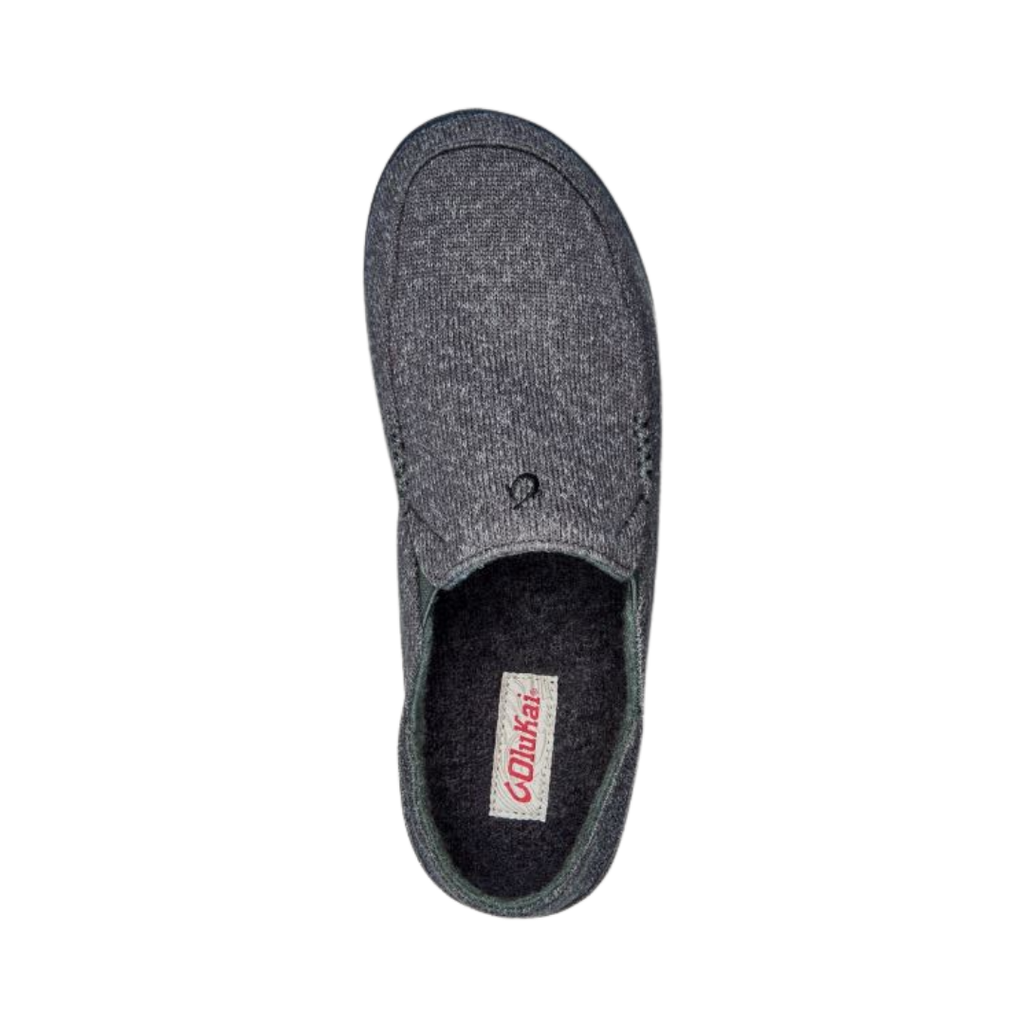 Top view of the Men’s Olukai Moloa Hulu in Dark Shadow, showing the dual-density anatomical PU footbed, full shearling lining, and hand-sewn moccasin construction.