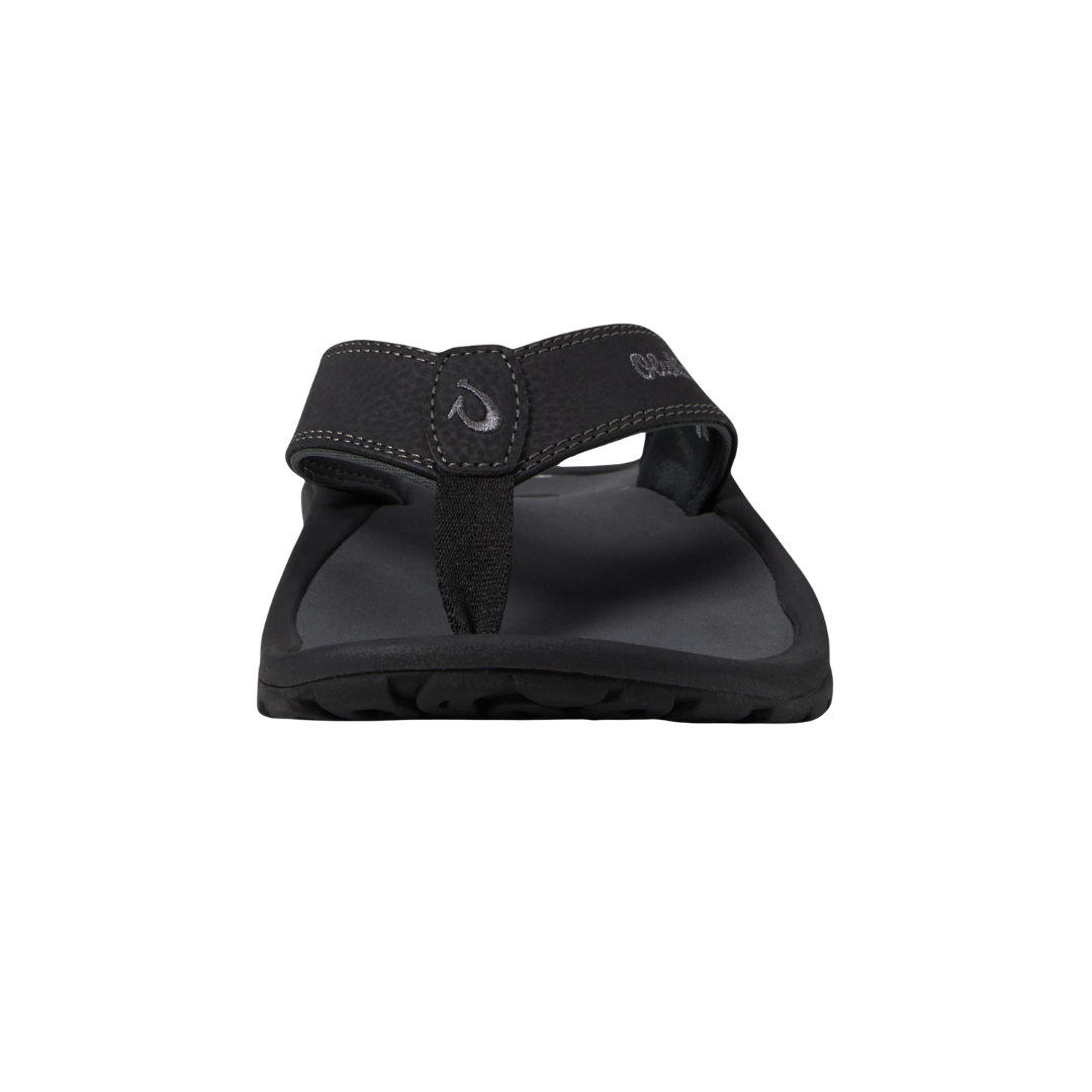 Front view of the Men’s Olukai ʻOhana in Black/Dark Shadow, showing the soft nylon toe post, contoured footbed, and supportive sandal structure.