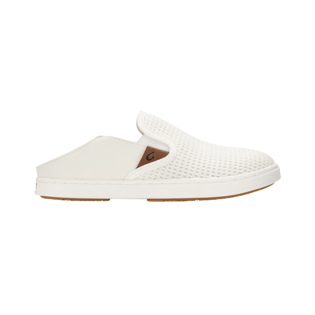 Side view of the Women’s Olukai Pehuea in Bright White, showcasing the soft full-grain leather upper, patented Drop-In Heel® design, and anatomical EVA footbed.