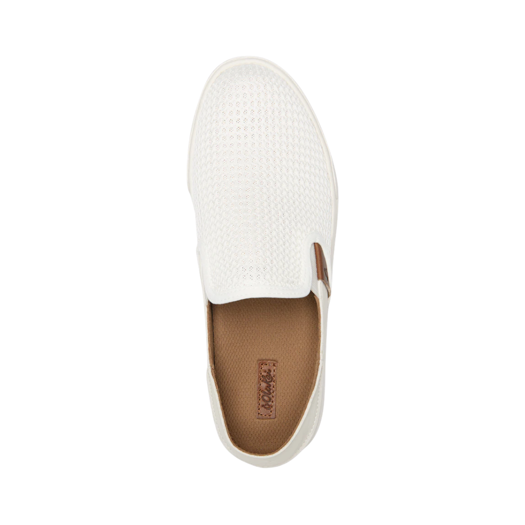 Top view of the Women’s Olukai Pehuea in Bright White, displaying the removable footbed, smooth leather upper, and slip-on convenience.