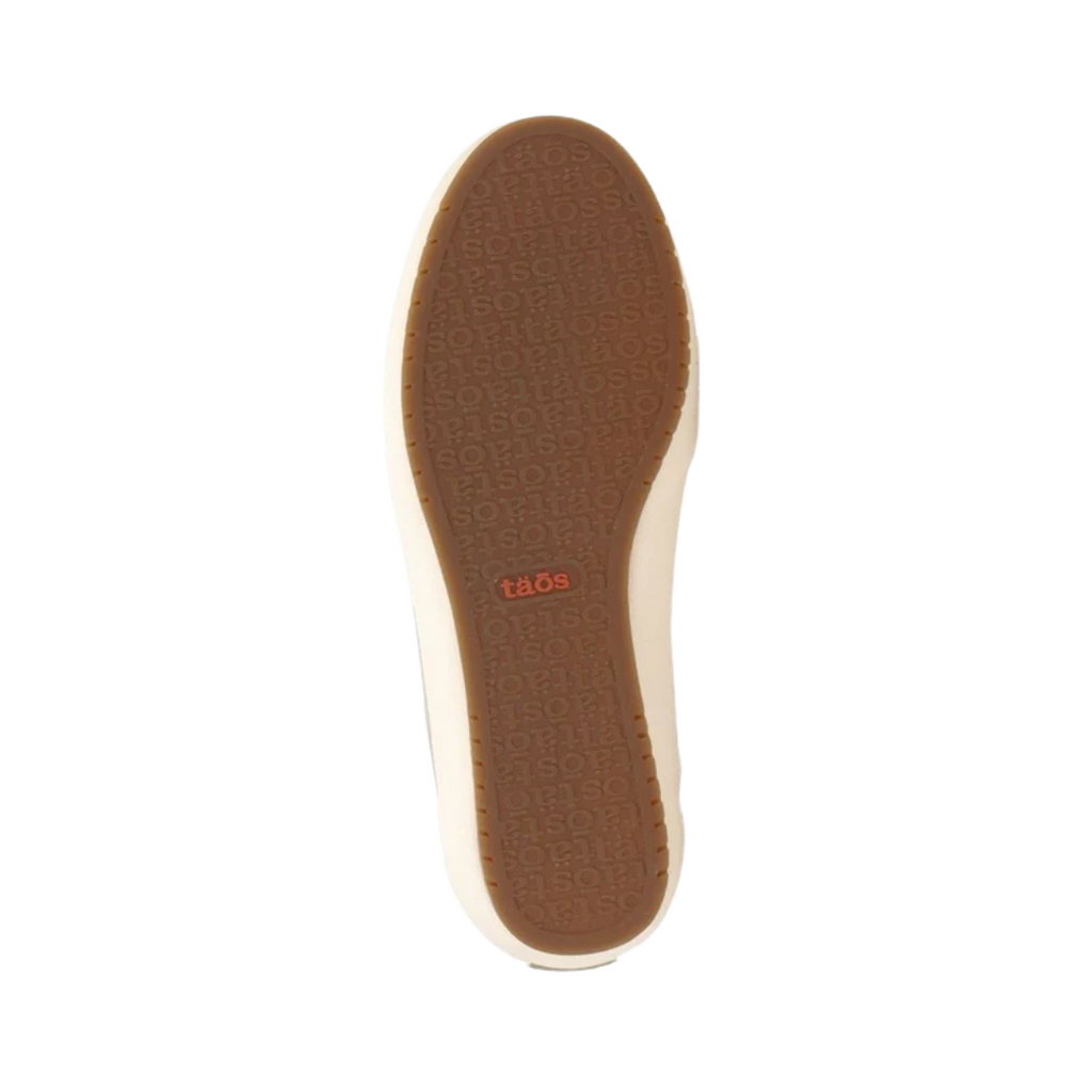 Bottom view of the Women’s Taos Shooting Star in Sage/Beige, showing the flexible rubber outsole designed to provide reliable grip and shock absorption on a variety of surfaces.